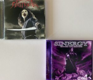 Sinergy / Stigmata - "Beware The Heavens / Stigmata" 2CD Bundle